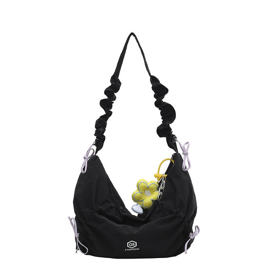 Damen lässige Beuteltasche mit verstellbarem Tragegurt und buntem Blumendetail Nord Taschen