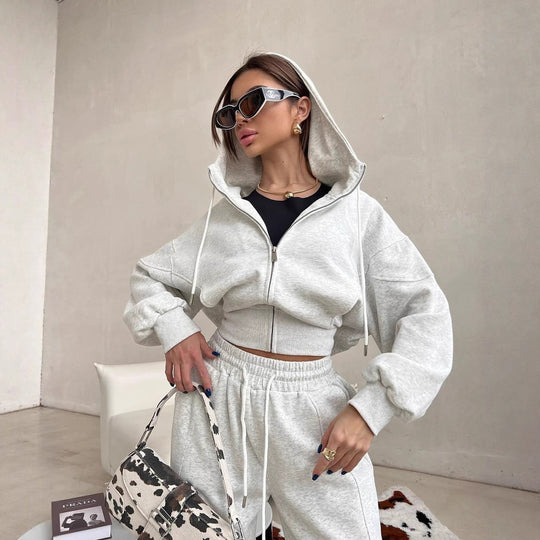 Damen kurzes Kapuzen-Sweatjacke mit Balloonärmeln und elastischer High-Waist Palazzo-Freizeithose Nord Taschen