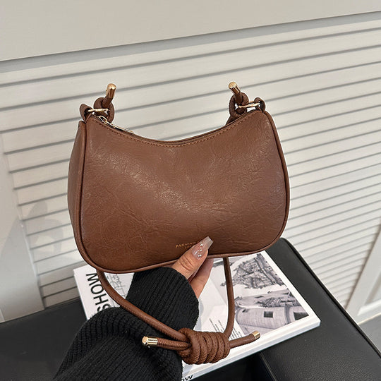 Damen Umhängetasche aus hochwertigem Kunstleder mit elegantem Knotenverschluss Nord Taschen
