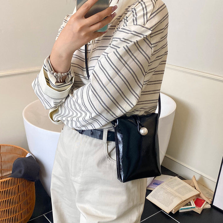 Damen elegante Handtasche mit perlenverziertem Verschluss Nord Taschen