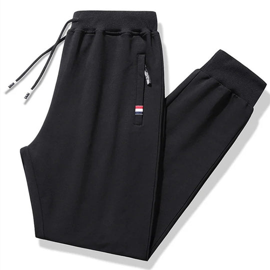 Herren Tapered-Jogginghose mit Tunnelzug, Reißverschlusstasche & Rippbündchen Nord Taschen