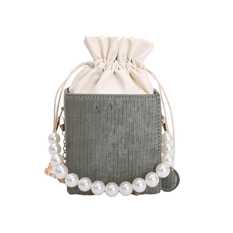Damen stilvolle Mini-Handtasche mit Kordelzug und Perlenakzent Nord Taschen