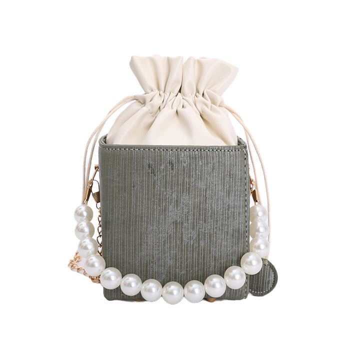 Damen stilvolle Mini-Handtasche mit Kordelzug und Perlenakzent Nord Taschen