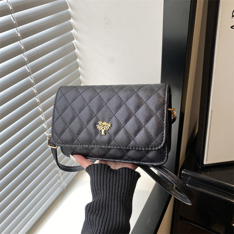 Damen Umhängetasche mit eleganter Steppung und goldenen Akzenten Nord Taschen