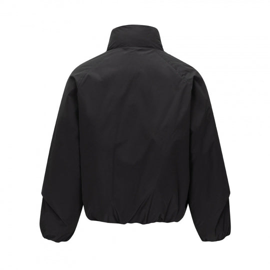 Unisex Kurz geschnittene leichte Windjacke im Boxy-Cut mit hohem Stehkragen und elastischem Saum Nord Taschen