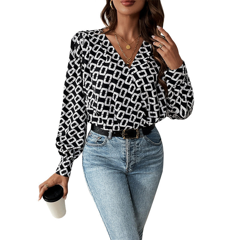 Damen Geometrische Print-Wickelbluse mit V-Ausschnitt, gerafften Schultern und ballonartigen Ärmeln Nord Taschen