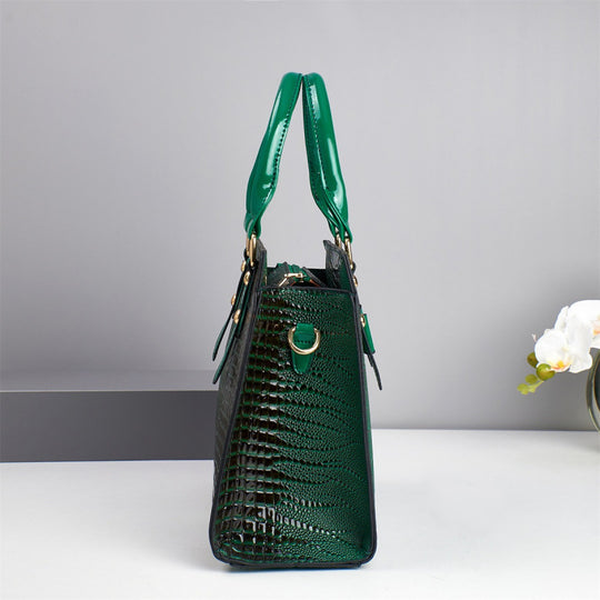 Damen elegante Handtasche mit schicker Schleifenapplikation und edlem Krokodil-Look Nord Taschen