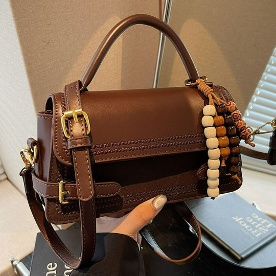 Damen elegante Umhängetasche mit kunstvoll geflochtenen Details Nord Taschen
