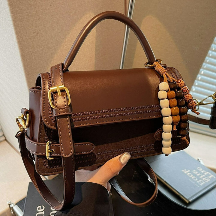 Damen elegante Umhängetasche mit kunstvoll geflochtenen Details Nord Taschen
