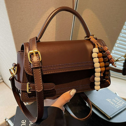 Damen elegante Umhängetasche mit kunstvoll geflochtenen Details Nord Taschen
