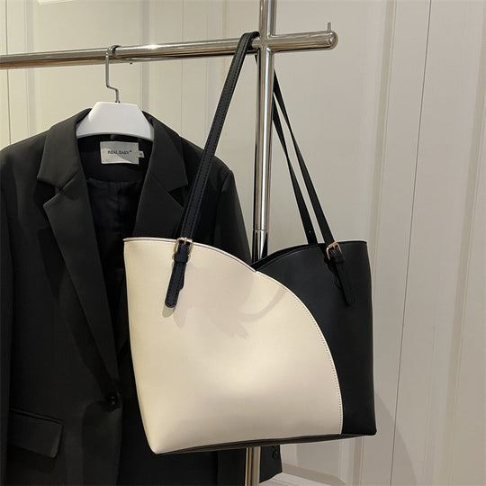 Damen elegante Handtasche mit asymmetrischem Design und robusten Trageriemen Nord Taschen