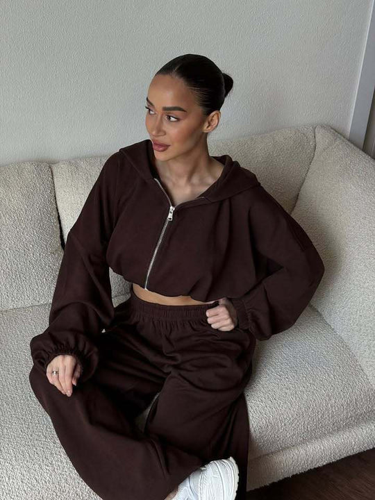 Damen cropped Kapuzen-Zipjacke mit Ballonärmeln und hochgeschnittener weiter Sweatpants-Set Nord Taschen