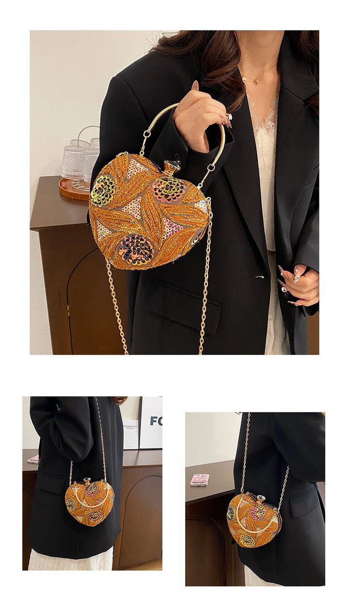 Damen Herzform Clutch mit aufwendiger Bead-Applikation Nord Taschen