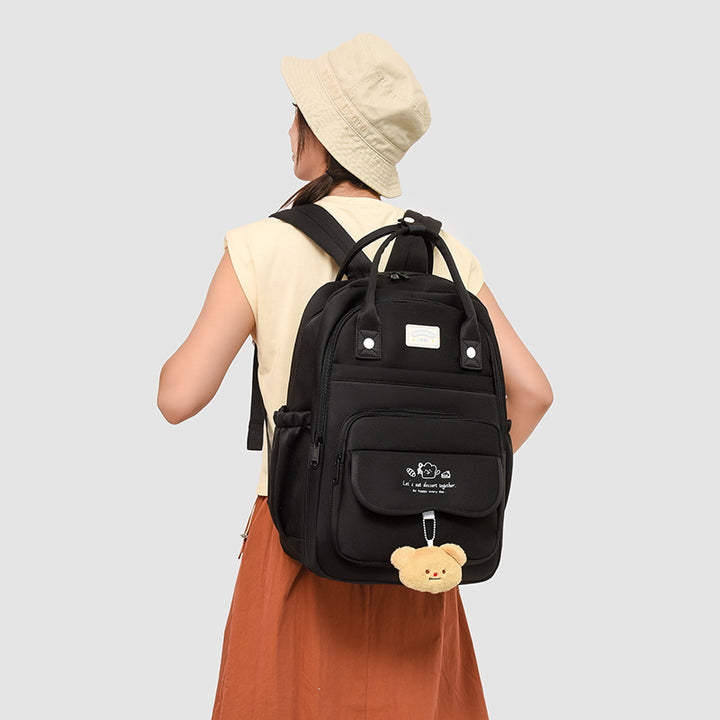 Damen Rucksack mit multifunktionalem Fächerdesign und verspieltem Plüschanhänger Nord Taschen