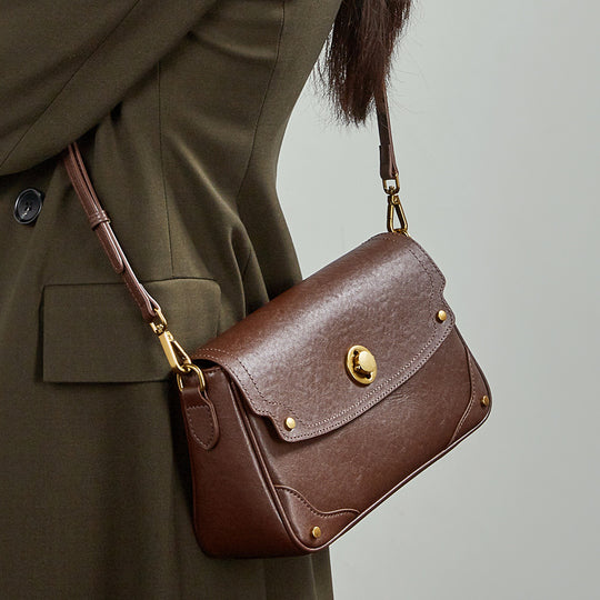Damen Umhängetasche aus hochwertigem Kunstleder mit eleganter Klappenöffnung Nord Taschen