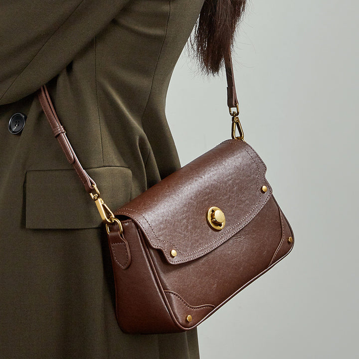 Damen Umhängetasche aus hochwertigem Kunstleder mit eleganter Klappenöffnung Nord Taschen