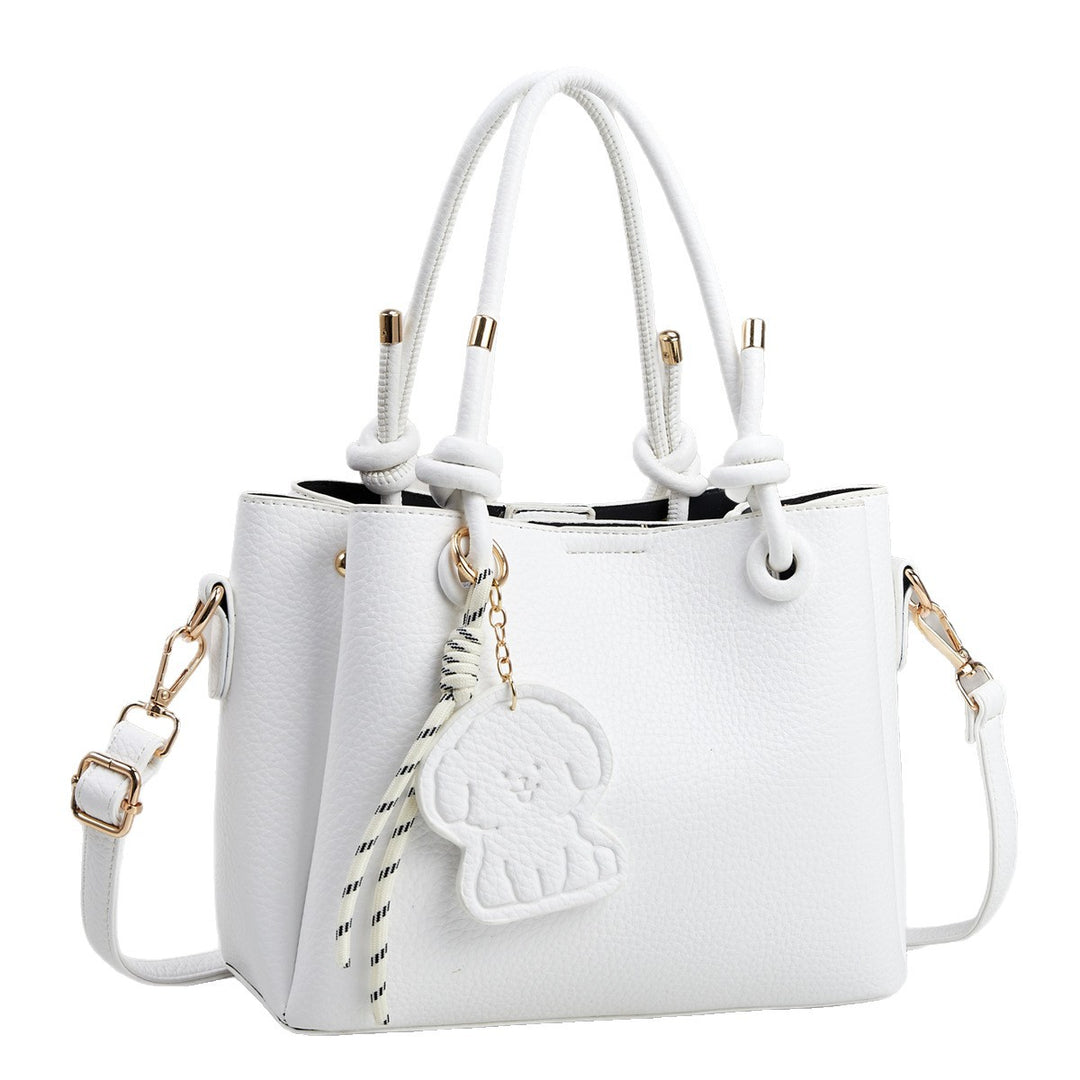 Damen Handtasche mit eleganten Details und abnehmbarer Quastenanhänger Nord Taschen