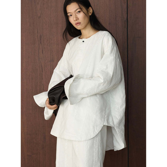 Damen Oversized strukturierte Longbluse mit Rundhals und verlängertem Saum Nord Taschen
