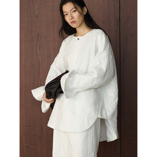 Damen Oversized strukturierte Longbluse mit Rundhals und verlängertem Saum Nord Taschen