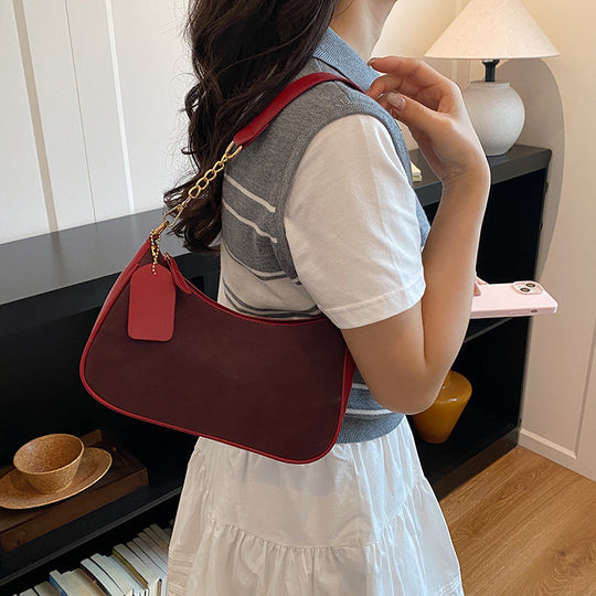 Damen elegante Umhängetasche mit feinem Kettenakzent Nord Taschen