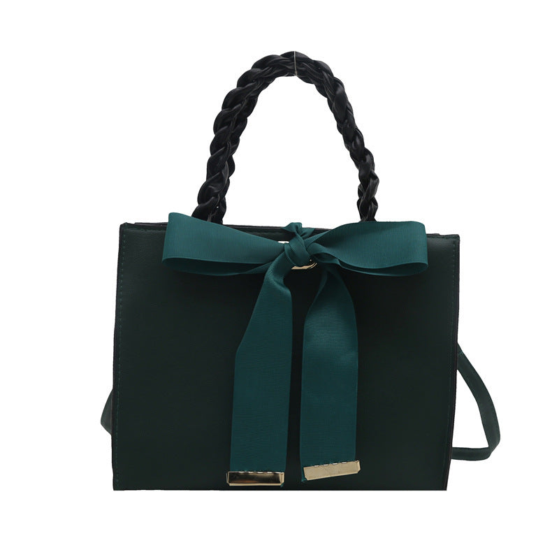 Damen elegante Handtasche mit geflochtenem Ledergriff und Schleifenakzent Nord Taschen