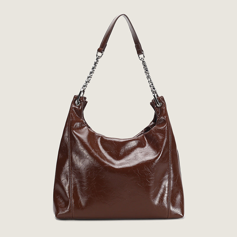 Damen Hobo-Tasche aus glänzendem Kunstleder mit luxuriösen Kettenakzenten Nord Taschen