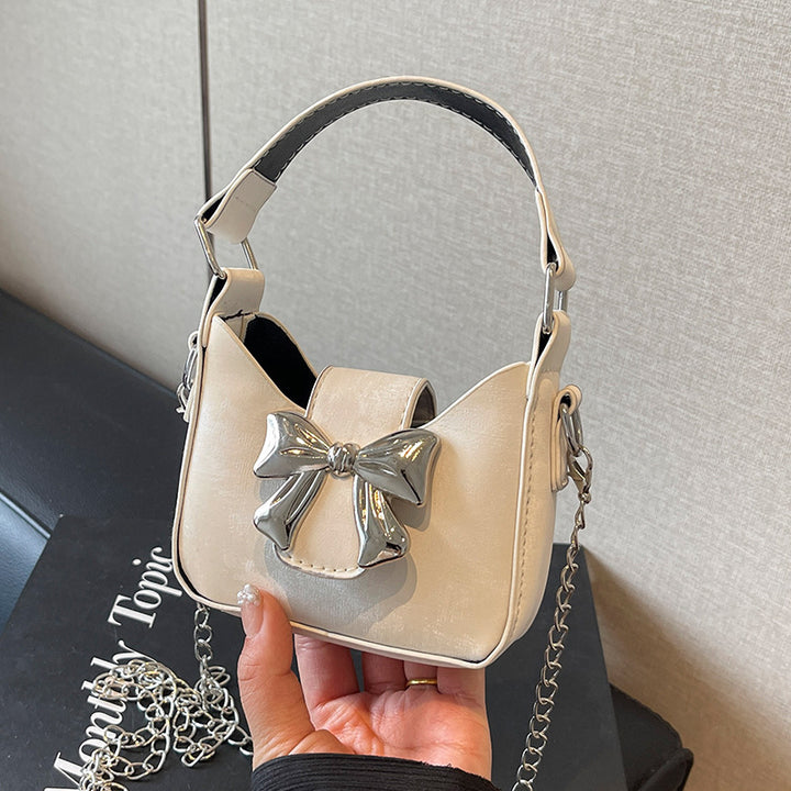 Damen Handtasche mit glänzendem Schleifenverschluss Nord Taschen