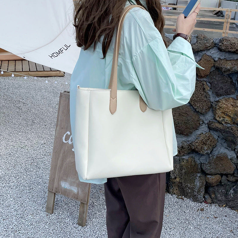 Damen elegante Tragetasche mit verspieltem Schnitt Nord Taschen
