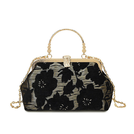 Damen stilvolle Handtasche mit floralem Design und goldfarbenen Akzenten Nord Taschen