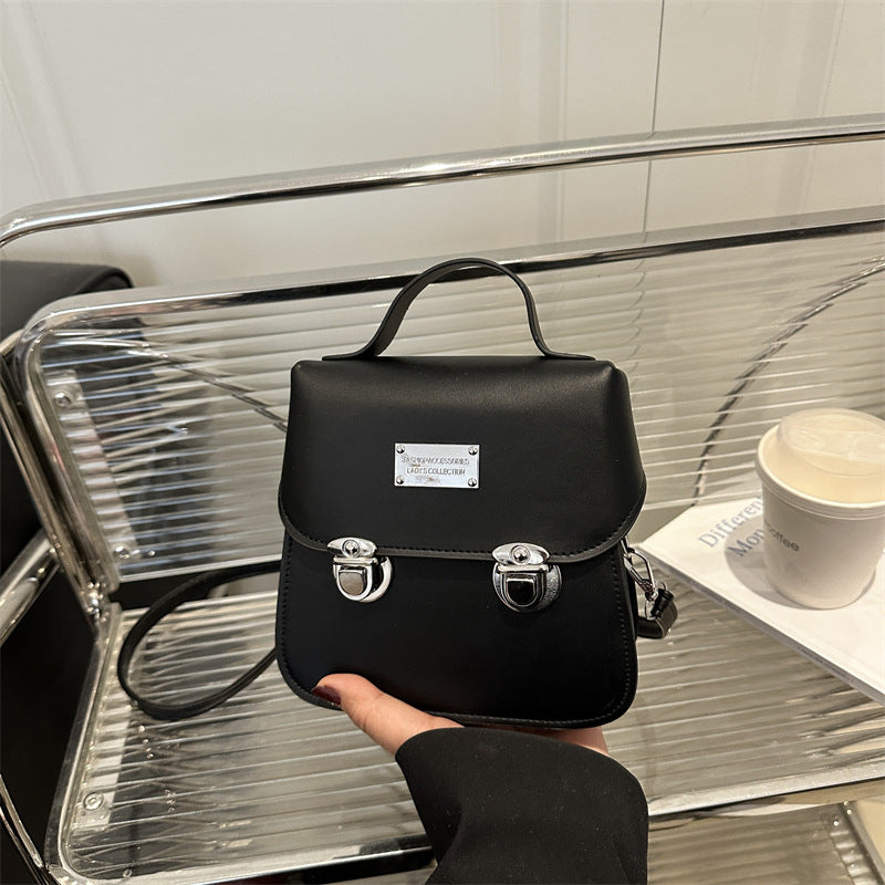 Damen praktische Crossbody-Rucksackhandtasche mit stilvollen Metallakzenten Nord Taschen