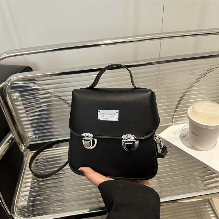 Damen praktische Crossbody-Rucksackhandtasche mit stilvollen Metallakzenten Nord Taschen