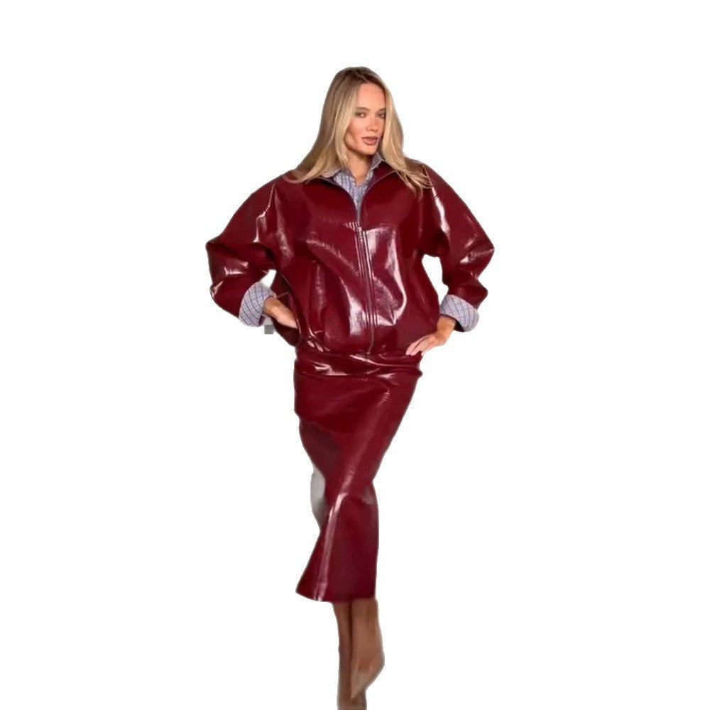 Damen Glänzendes Kunstleder-Zweiteiler mit Oversize-Zipjacke und tailliertem Midirock Nord Taschen