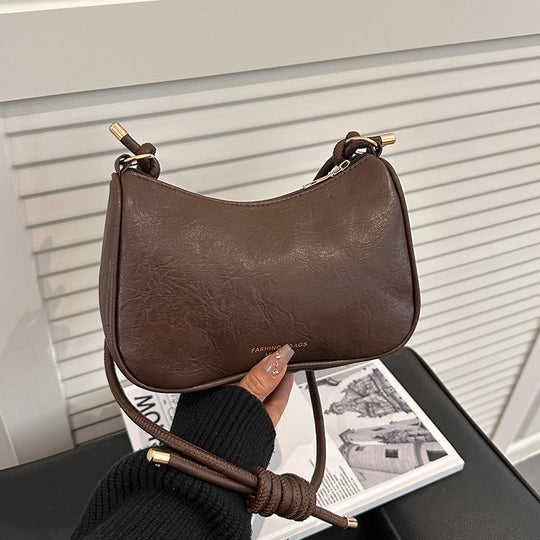 Damen Umhängetasche aus hochwertigem Kunstleder mit elegantem Knotenverschluss Nord Taschen