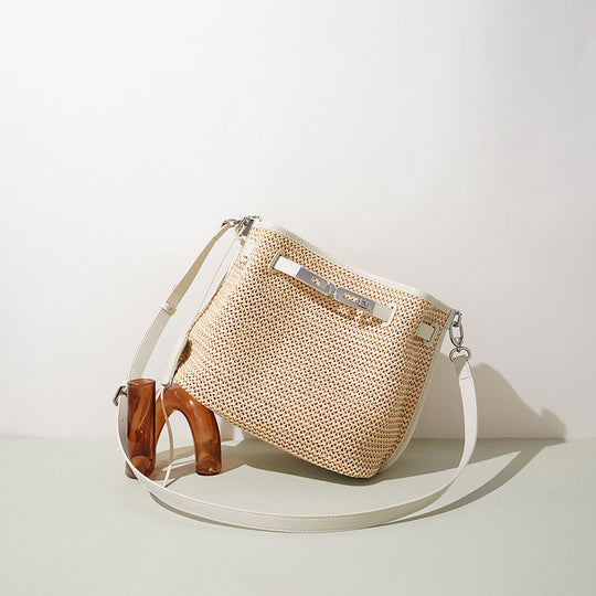 Damen Bucket-Tasche aus geflochtenem Material mit Lederakzenten Nord Taschen