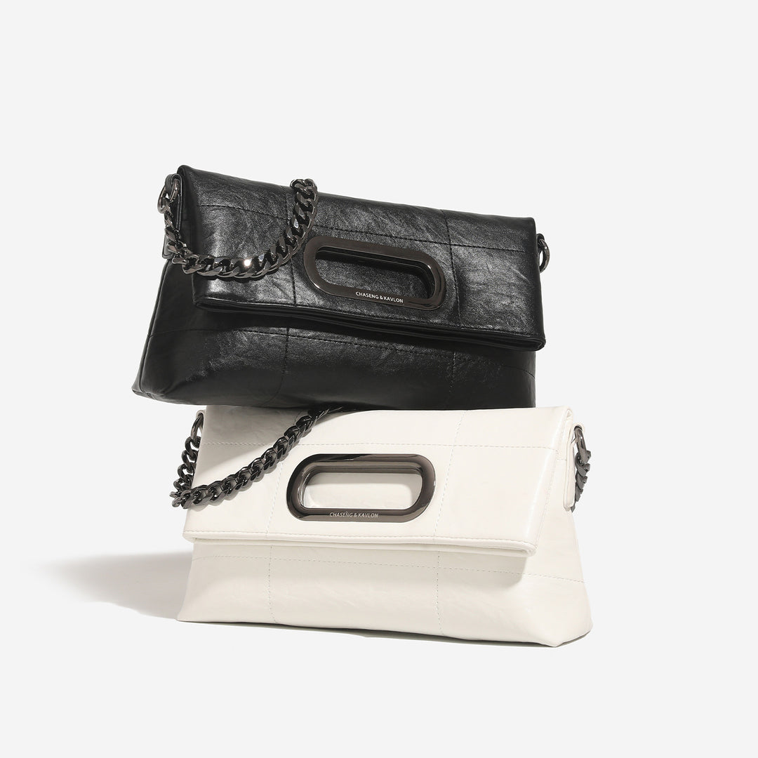 Damen Umhängetasche aus weichem Leder mit dekorativem Kettenriemen Nord Taschen