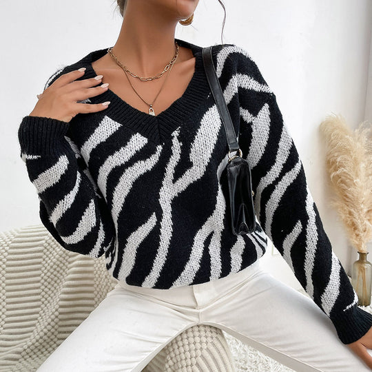 Damen Oversize V-Ausschnitt Pullover mit Zebra-Jacquard und gerippten Bündchen Nord Taschen