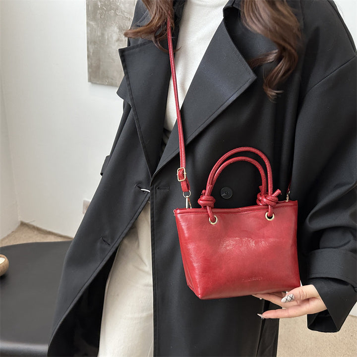 Damen Handtasche mit geflochtenem Tragegriff Nord Taschen