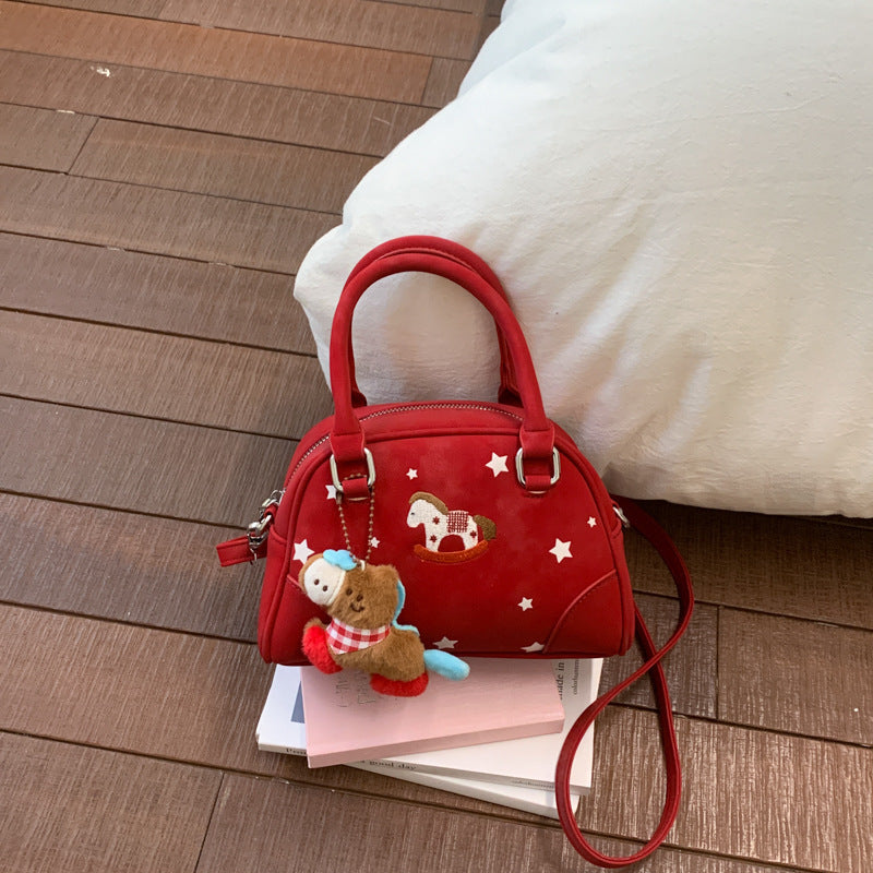 Damenhandtasche mit tierischem Motiv und dekorativen Sternen Nord Taschen