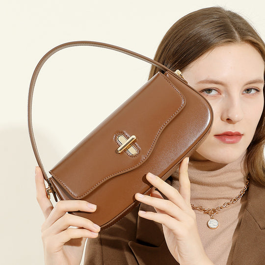 Damen elegante Umhängetasche mit feinem Leder und goldenen Akzenten Nord Taschen