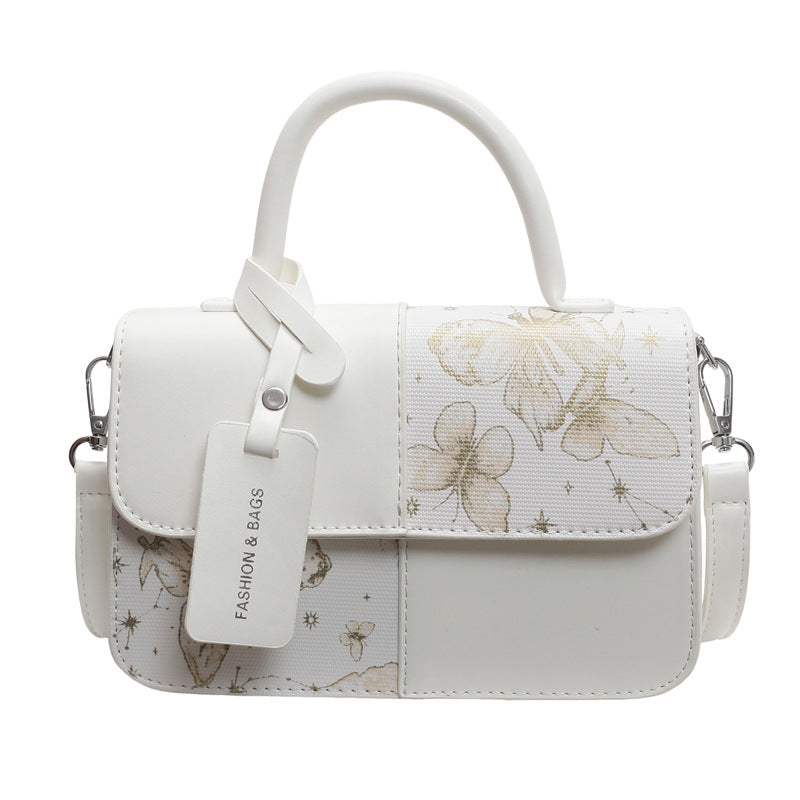 Damen mode Handtasche mit floralem Druck und praktischem Tragegriff Nord Taschen