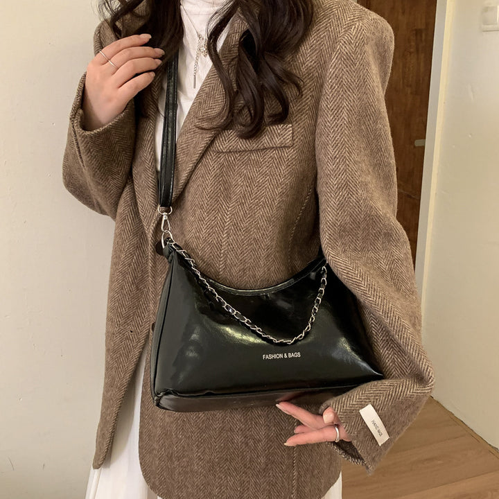 Damen Umhängetasche mit luxuriösem, poliertem Kunstleder und vielseitigem Tragegurt Nord Taschen