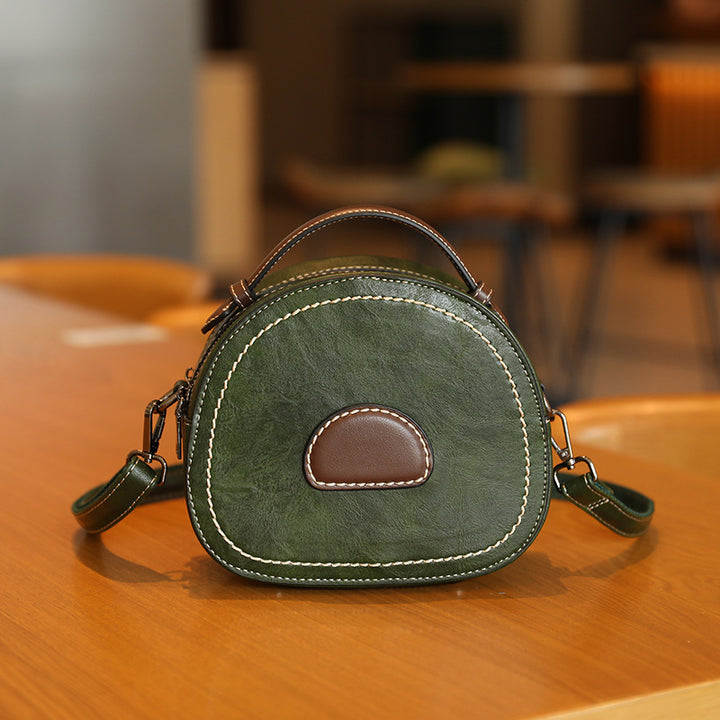 Damen Designer Umhängetasche mit innovativem runden Schnitt Nord Taschen