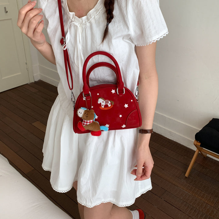 Damenhandtasche mit tierischem Motiv und dekorativen Sternen Nord Taschen