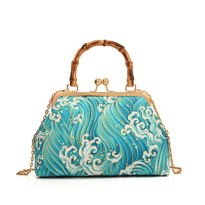 Damen Designer Handtasche mit kunstvollem Wellenmotiv Nord Taschen