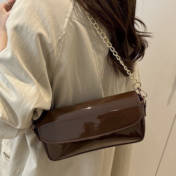 Damen elegante Clutch mit Kettenakzenten Nord Taschen