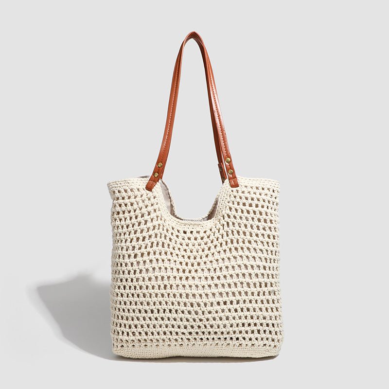Damen Handtasche aus gewebtem Naturmaterial mit eleganten Lederakzenten Nord Taschen