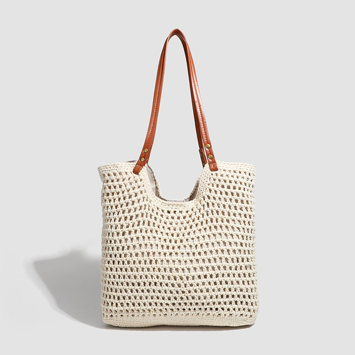 Damen Handtasche aus gewebtem Naturmaterial mit eleganten Lederakzenten Nord Taschen