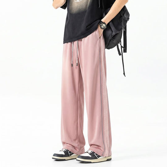 Herren Weite Trackhose im Oversize‑Schnitt mit Tunnelzug und seitlichem Karomuster‑Streifen Nord Taschen
