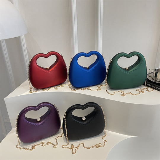 Damen Herzform Clutch mit Kettenriemen Nord Taschen