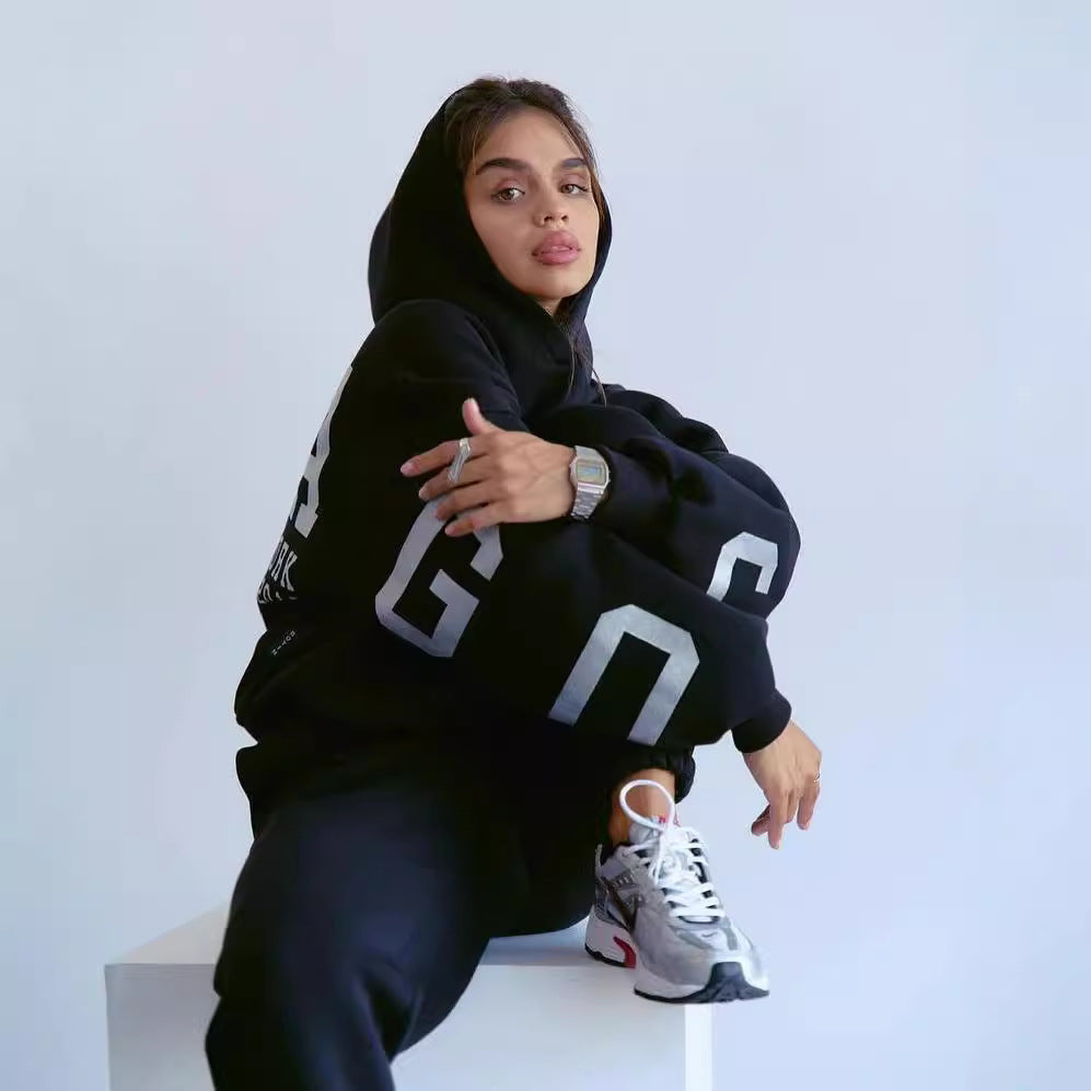 Damen Oversized Kapuzenpullover mit großflächigem Blockprint Nord Taschen